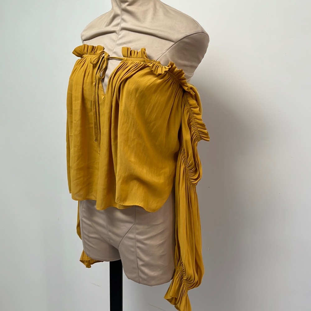Yellow shoulderless blouse